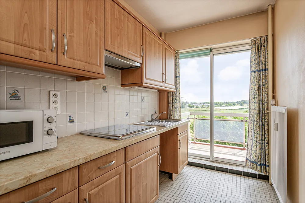 Appartement ensoleillé avec terrasse et garage box dans un endroit agréable