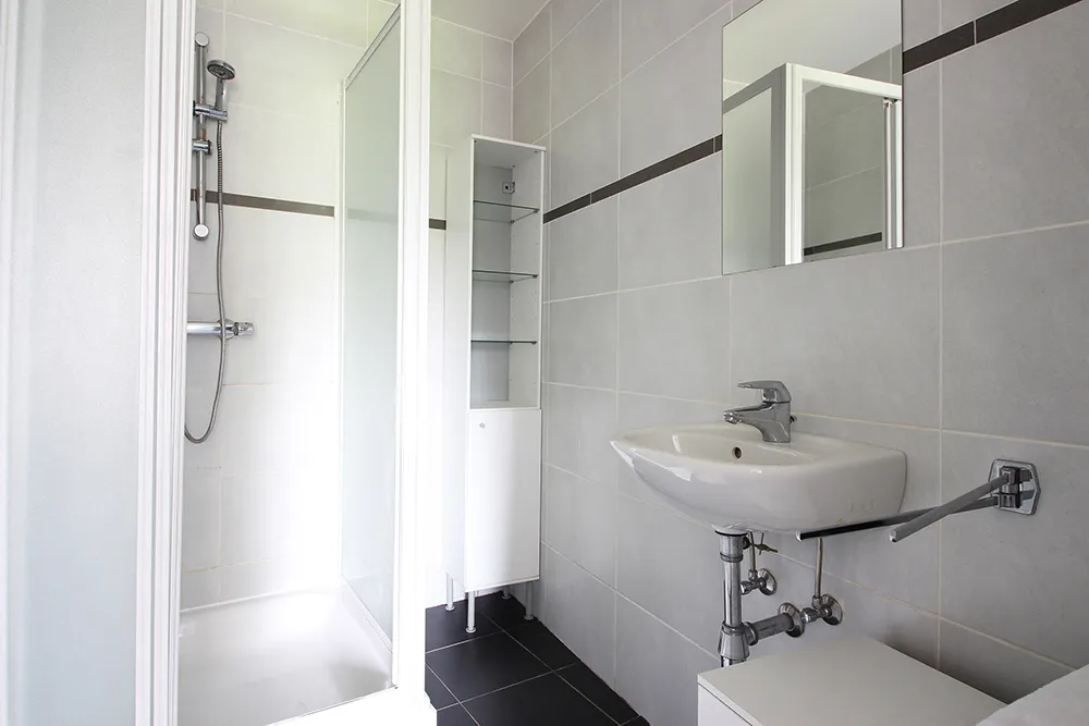 Appartement au rez-de-chaussée à haut rendement (5,5%)