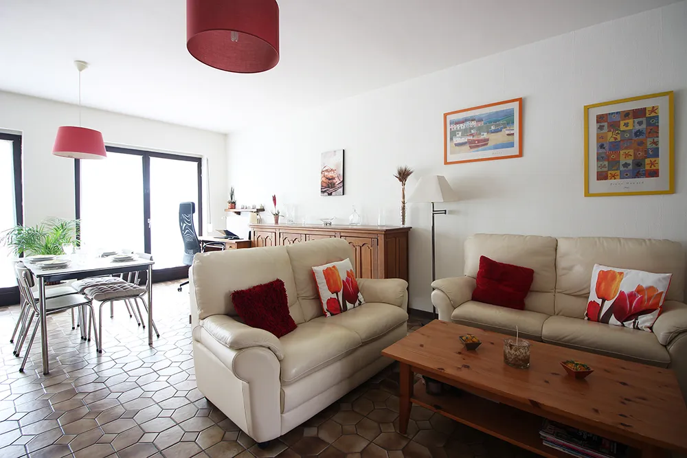 Maison spacieuse avec 5 chambres, garage et jardin dans un quartier agréable