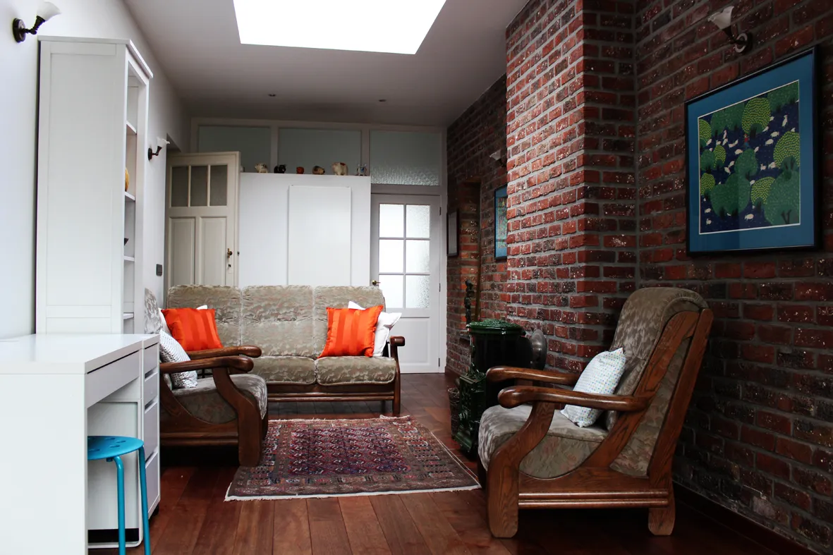 Unieke woning met tuin en bijgebouw (atelier)
